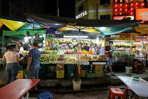 KUALA LUMPUR, MALAYSIA- MARCH 28, 2018 Hosting a lot of hawker stalls and seafood restaurants, Jalan Alor is one of the most famous roads in Kuala Lumpur for food. photo