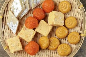 Laddu laddoo motichoor bundi  Soan papdi papri shonpapri Sandesh shondesh traditional Bengali sweets photo