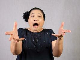 Elderly senior Asian woman posing facial expression photo