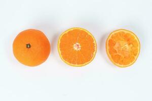 Mandarin Orange Fruit slice half juiced extracted on white background photo