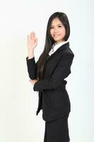 One young Asian Malaysian business office woman holding blank copy text space sign board on white background photo