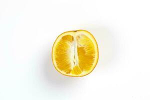 Orange Fruit half cut slices top view white background photo