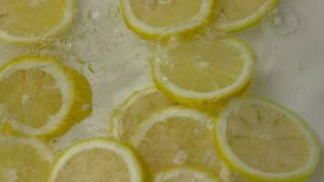 Lemon, slow motion, slow motion of lemon in water video