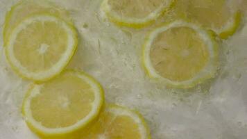 Lemon, slow motion, slow motion of lemon in water video