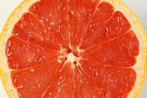 Ruby red grapefruit cut closeup photo