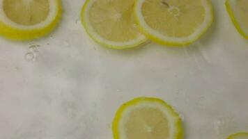 Lemon, slow motion, slow motion of lemon in water video