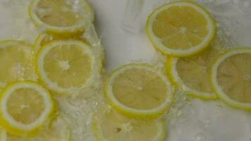 Lemon, slow motion, slow motion of lemon in water video