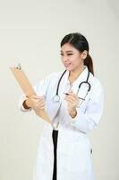 Young Asian female doctor wearing apron uniform tunic apron hold photo