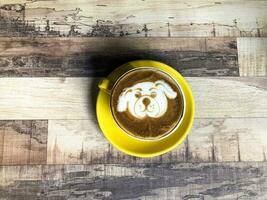 Coffee latte with dog puppy milk art photo