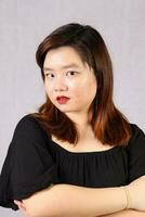 Young attractive southeast Asian woman posing facial expression photo