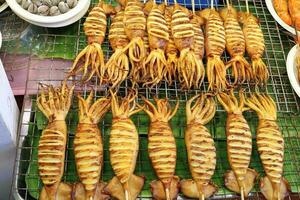 Grilled BBQ Squid cuttlefish calamari at street side stall photo