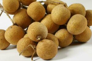 cats eye mata Kuching fruit on white backgroun d photo
