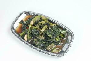 Stair fired green Chinese broccoli kalian leaf vegetable with garlic can oyster sauce photo