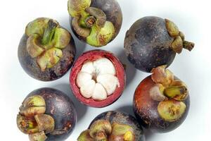 Mangosteen fruit on white background photo