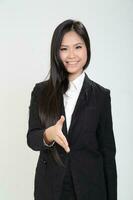 One young Asian Malaysian business office woman holding blank copy text space sign board on white background photo