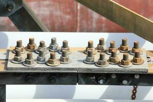 Rusted steel metallic bolt photo