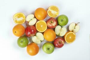 mix green red apple orange whole fruit cut slice half on white background photo