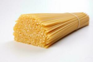 dry raw spaghetti laid on white background macro closeup photo