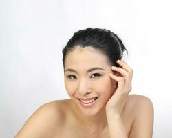 Young beautiful Southeast Asian woman beauty fashion makeup light grey white background photo