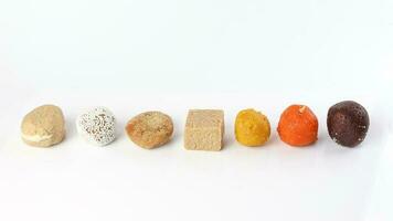 Traditional Bengali sweet sandesh rosokdom kalojam laddu Balushahi photo