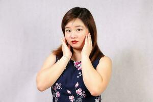 Young attractive southeast Asian woman posing facial expression look pretty photo