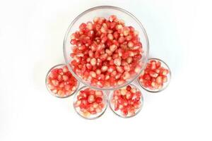 Pomegranate fruit white background photo