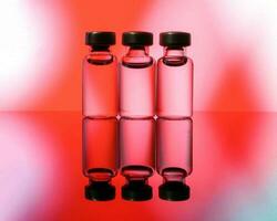 Small vaccine injection bottle transparent reflection refraction red led light background photo