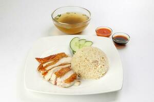 South east asian style chicken rice set steamed roasted sliced chicken with soup dark chilli sauce malaysia china photo