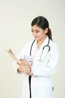 Young Asian female doctor wearing apron uniform tunic apron hold photo