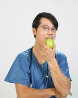 Young Asian male female doctor wearing apron uniform tunic apron hold photo