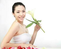 Young beautiful Southeast Asian woman beauty fashion makeup light grey white background photo