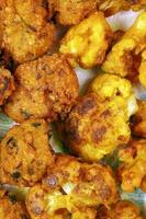 Battered deep fried cauliflower pakora piaju photo