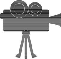 Black film camera on tripod. vector