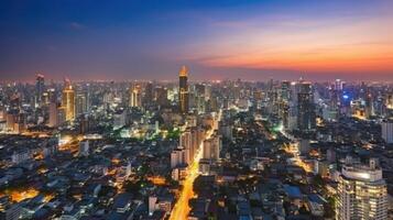 Cityscape Night View of Residential Houses and High Skyscrapers in Financial District at Bangkok Thailand. Technology. photo