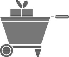 Shopping Cart With Gift Box Icon In Black And White Color. vector