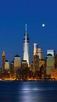 Panoramic View of Lower Manhattan Skyline Illuminated at Night in New York City. Technology. photo