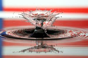 Water droplet drop splash collision dripping pillar Malaysia Flag reflection refraction independence country patriot photo