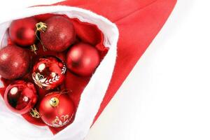 Christmas Hat Red Ornament Decoration on white background photo