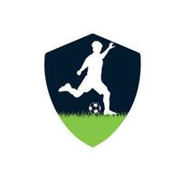 Football soccer player man on grass inside a shield guard white background. Vector illustration