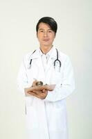 Young Asian male doctor wearing apron uniform tunic apron hold photo