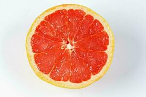 Ruby red grapefruit cut closeup photo