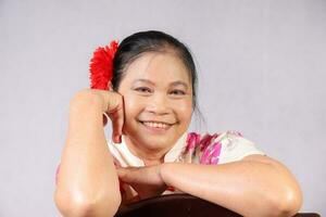 Elderly senior Asian woman posing facial expression photo