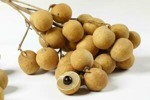 cats eye mata Kuching fruit on white backgroun d photo