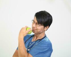 Young Asian male female doctor wearing apron uniform tunic apron hold photo