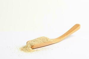 Psyllium Husk Isobgol on white background photo