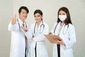 asian doctors in white apron photo