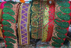 Multicolor polyester half moon lace,gotta lace in market,fancy colorful thread and zari jhalar roll lace photo