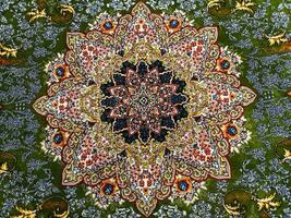 Central fragment of beautiful oriental persian carpet with colorful texture photo