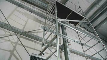 View Of Tall Metal Scaffold Structure On Interior Construction Job Site. video