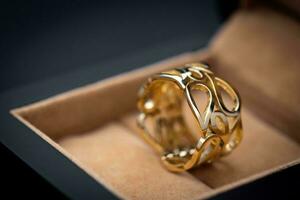 Gold ring in jewelry box photo